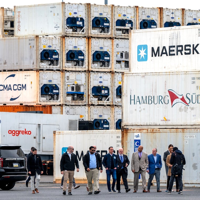 Gov. Josh Shapiro arrives among shipping containers at the Port of Philadelphia on Thursday, Apr. 10, 2025, for an event the day after President Trump paused some tariffs. The uncertainty around tariffs has affected CEO confidence and consumer confidence, economist Joel Naroff writes.