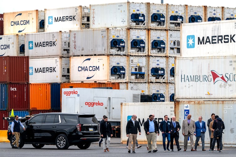 Gov. Josh Shapiro arrives among shipping containers at the Port of Philadelphia on Thursday, Apr. 10, 2025, for an event the day after President Trump paused some tariffs. The uncertainty around tariffs has affected CEO confidence and consumer confidence, economist Joel Naroff writes.