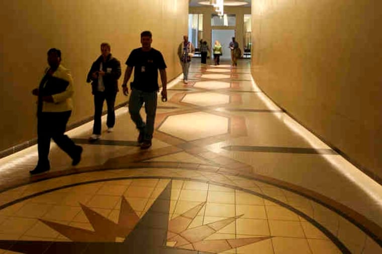 Visitors enter the new IRS building, formerly the 30th Street Post Office, in 2011. Philadelphia IRS employees are among those affected by changes in Treasury Department workplace policies.