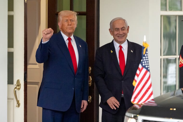 President Donald Trump, left, stands with Israel's Prime Minister Benjamin Netanyahu at the West Wing of the White House, April 7, 2025, in Washington.