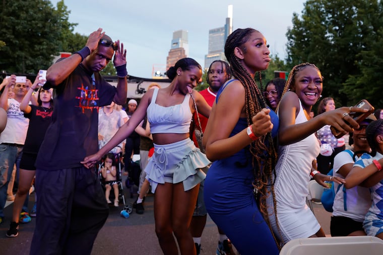 Fans dance to during the Wawa Welcome America Fourth of July Concert on the Parkway in Phila., Pa. on July 4, 2022. In 2025, LL Cool J and Philly native Jazmine Sullivan will headline the show.