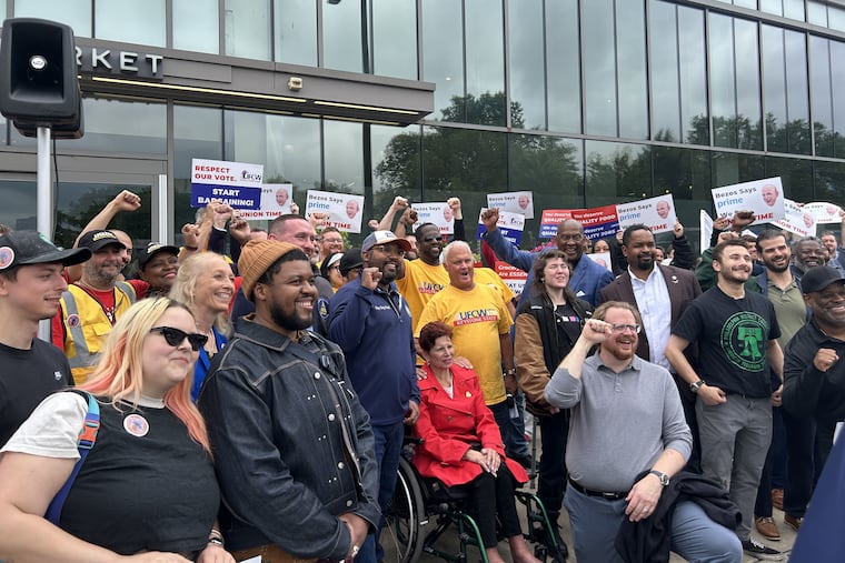 Whole Foods workers and elected officials gathered outside the store at 2101 Pennsylvania Ave. during a rally Thursday. The regional labor board officials certified a January union election there, but Whole Foods intends to appeal the decision.