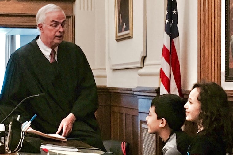 Judge Barrett often talked with children in his courtroom.