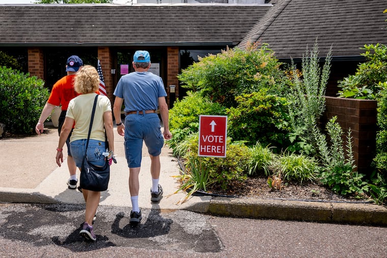 Voters arrive at the election polling place inside St. Michael’s Church, at King’s Highway and Chapel Avenue in Cherry Hill on Jun. 10.