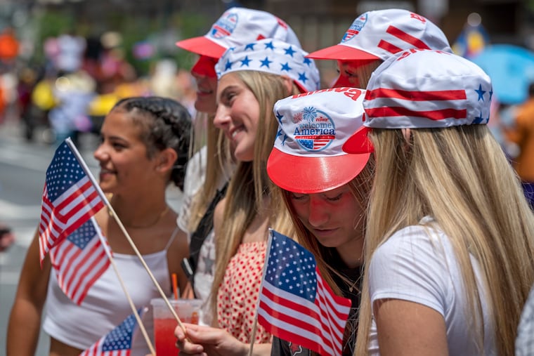 Members of the South Sound Roots Academy under 17 basketball travel team from Olympia, Washington pose for a photo by their coaches and family while attending the Salute to Independence Parade on Market Street Thursday, July 4, 2024, as the city celebrates the Fourth of July and observes the evolving history of America’s freedom. They will be participating in a tournament in Lancaster County the coming weekend.