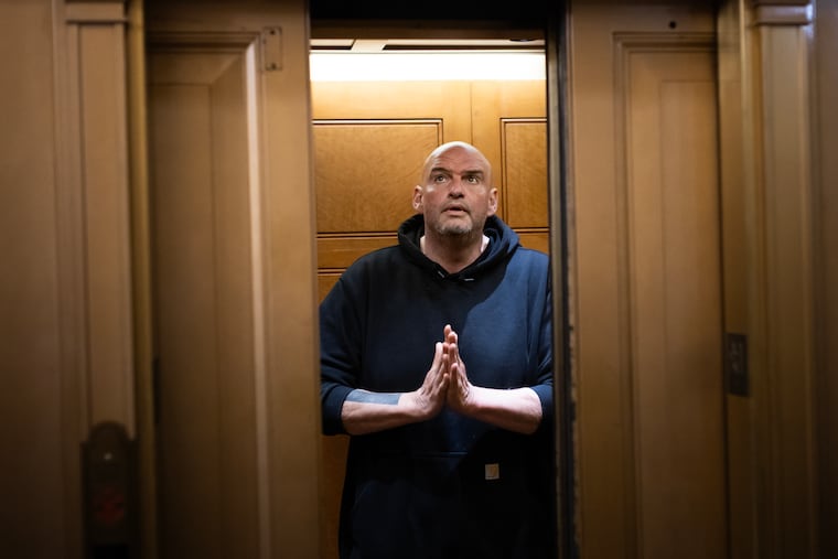 Sen. John Fetterman (D-Pennsylvania) enters an elevator ahead of a vote on May 7 at the U.S. Capitol. 