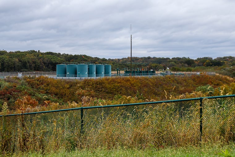 In this 2019, photo, storage tanks are seen at a shale gas well pad in Zelienople, Pa.