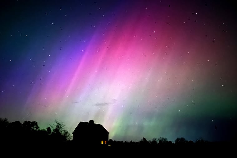 The northern lights flare in the sky over a farmhouse last year in Brunswick, Maine. 