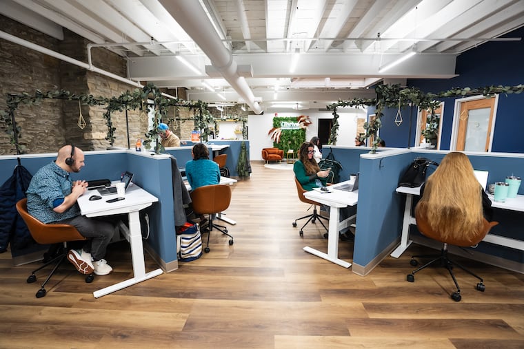 Entrepreneurs and remote workers share office space at iThrive Coworking in Wyncote. At front left is Luke Balmelli-Everhart, who works in regulatory operations for a pharmaceutical company. Second from right is Erica Dockray, whose new business does birthday and artwear workshops, crafting experiences, and events.