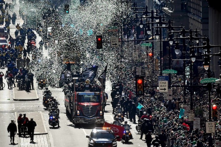 Eagles mascot Swoop leads the team buses up South Broad Street as the Eagles Super Bowl victory parade approaches City Hall on Thursday, Feb. 8, 2018.