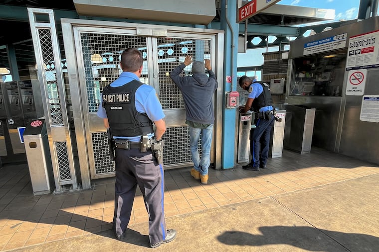 SEPTA Transit Police officers monitor turnstiles at the Market-Frankford Line subway station at Kensington and Allegheny Avenues.