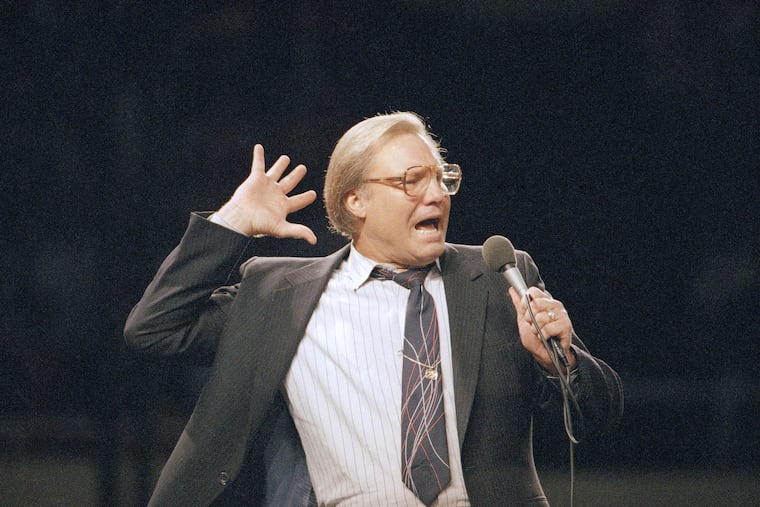 The Rev. Jimmy Swaggart preaches to nearly 14,000 people in Los Angeles in 1987. 