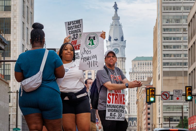 Philadelphia municipal workers, AFSCME District Council 33, strike outside police headquarters, 400 N. Broad St., Tuesday morning July 1, 2025.