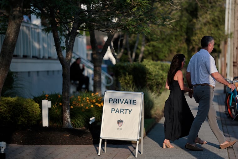 A couple leaving a party at the private club Union League Whitebrier in Avalon recently. 