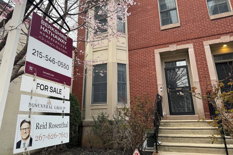 A sign advertised this house for sale in Philadelphia's Spring Garden neighborhood last March.
