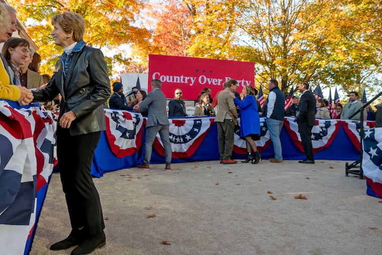 Former N.J. Gov. Christine Todd Whitman (left) and other former Republicans greet supporters in the crowd after they appeared onstage with Vice President Kamala Harris at a Republicans for Harris event in Washington Crossing last year.